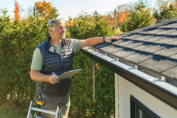 Professional Hail Damage Roof Repair technician working in Plush, OR